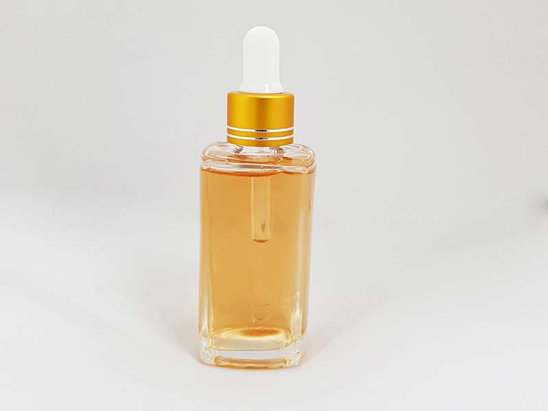 golden bottle with serum